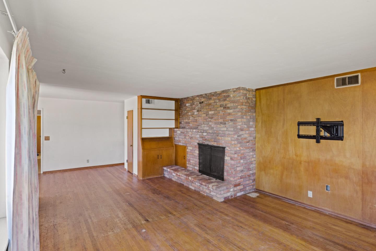 30 Acropolis Street Pacific Grove, CA 93950 - Photo 6 of 36 a view of empty room with a fireplace