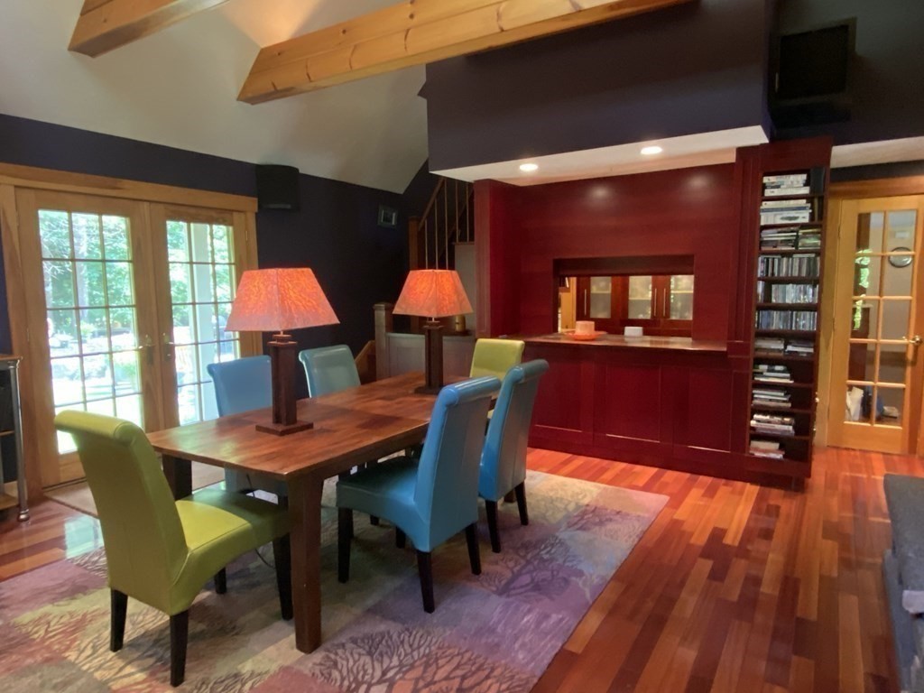231 Turkey Hill Trail Rutland, MA 01543 - Photo 15 of 42 a dining room with furniture and wooden floor