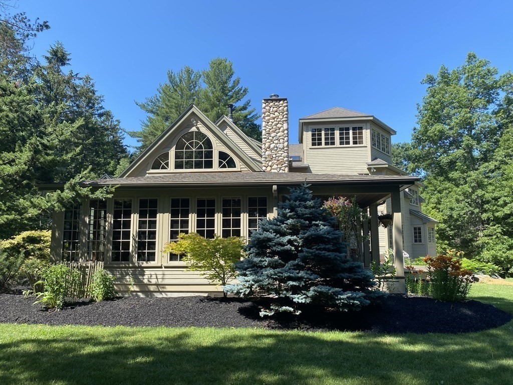 231 Turkey Hill Trail Rutland, MA 01543 - Photo 3 of 42 a front view of a house with garden