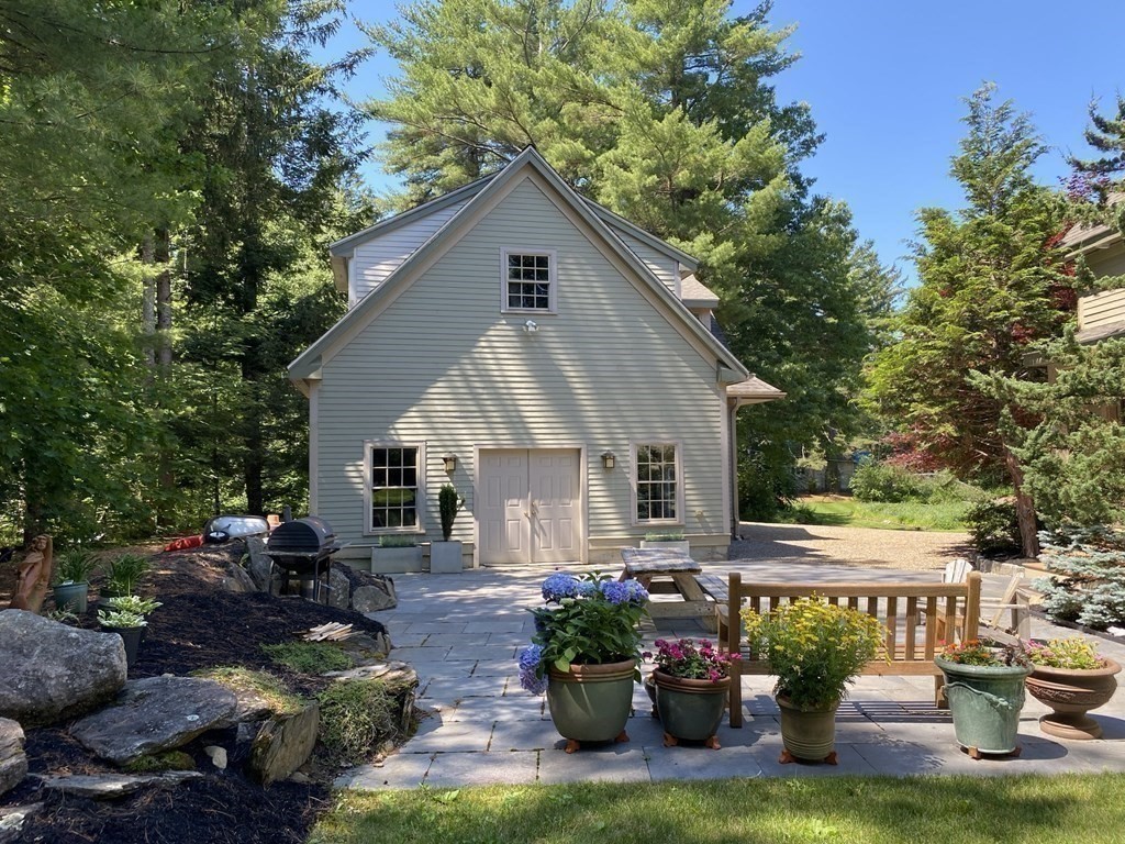 231 Turkey Hill Trail Rutland, MA 01543 - Photo 39 of 42 a view of a house with backyard and sitting area