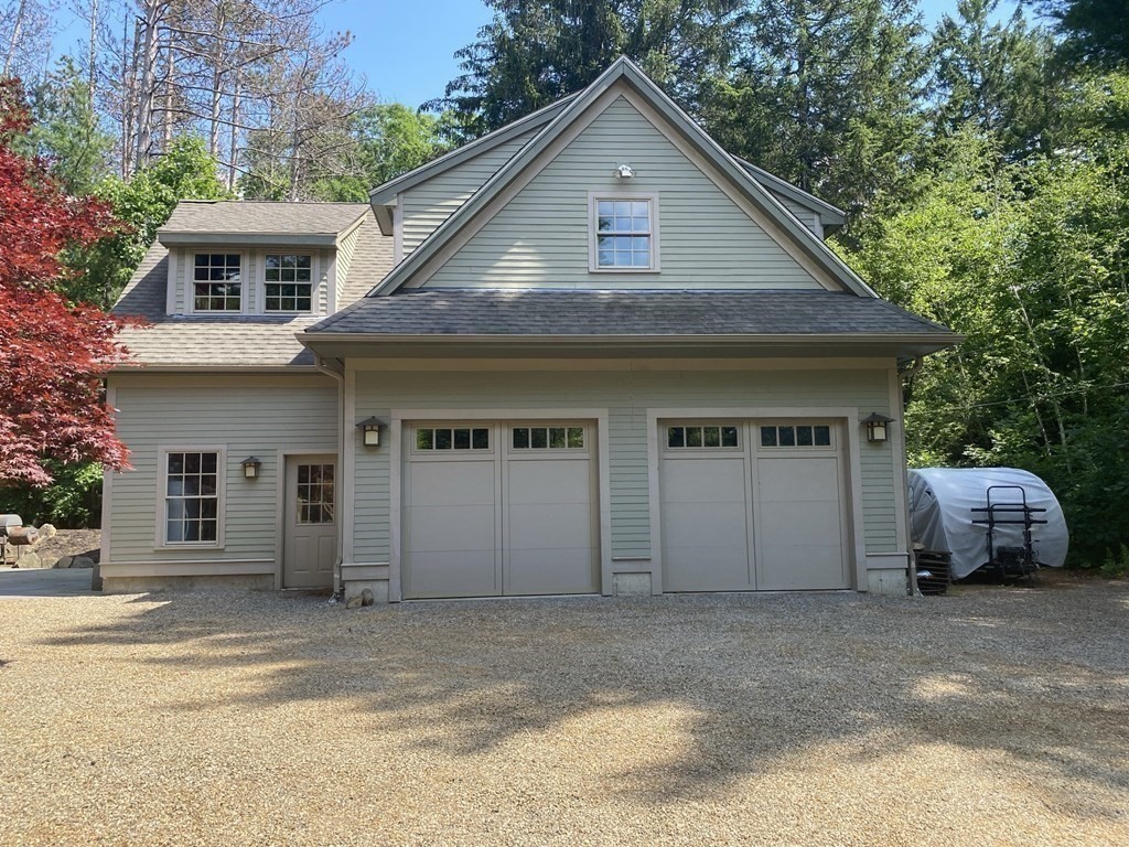 231 Turkey Hill Trail Rutland, MA 01543 - Photo 40 of 42 a view of a house with a patio