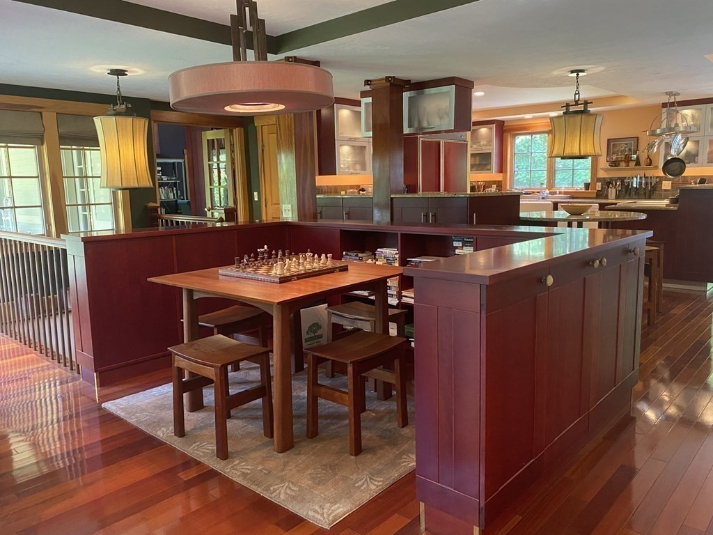 231 Turkey Hill Trail Rutland, MA 01543 - Photo 7 of 42 a room with stainless steel appliances kitchen island granite countertop dining table chairs and a large window