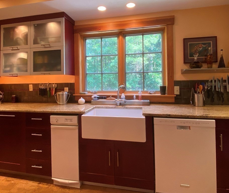 231 Turkey Hill Trail Rutland, MA 01543 - Photo 10 of 42 a kitchen with a sink and a large window