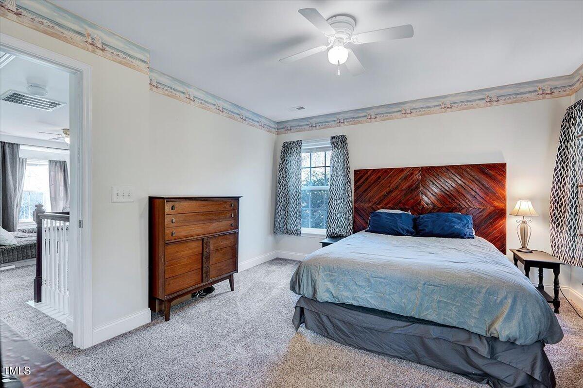 197 Depot Ridge Road Garner, NC 27529 - Photo 21 of 28 Primary Bedroom