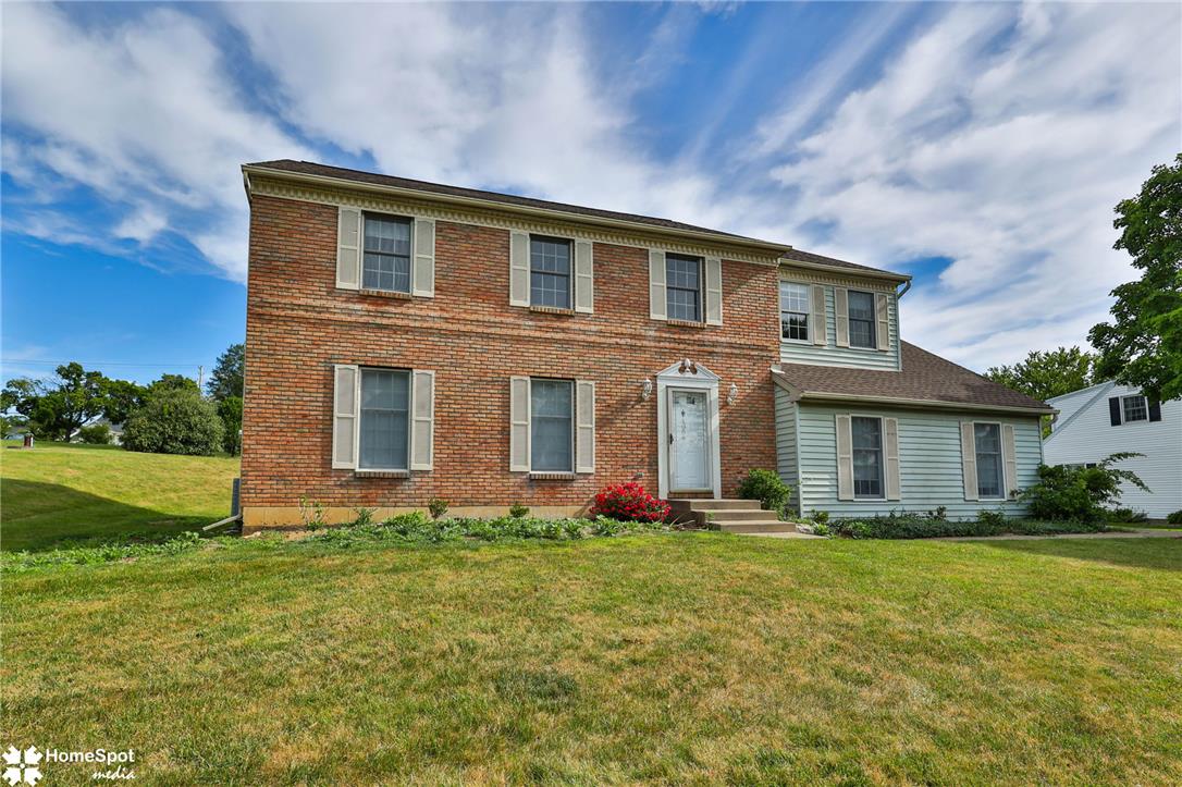 4059 Wedgewood Road Allentown, PA 18104 - Photo 2 of 72 A classic brick and siding home with neatly manicured lawn offers curb appeal.