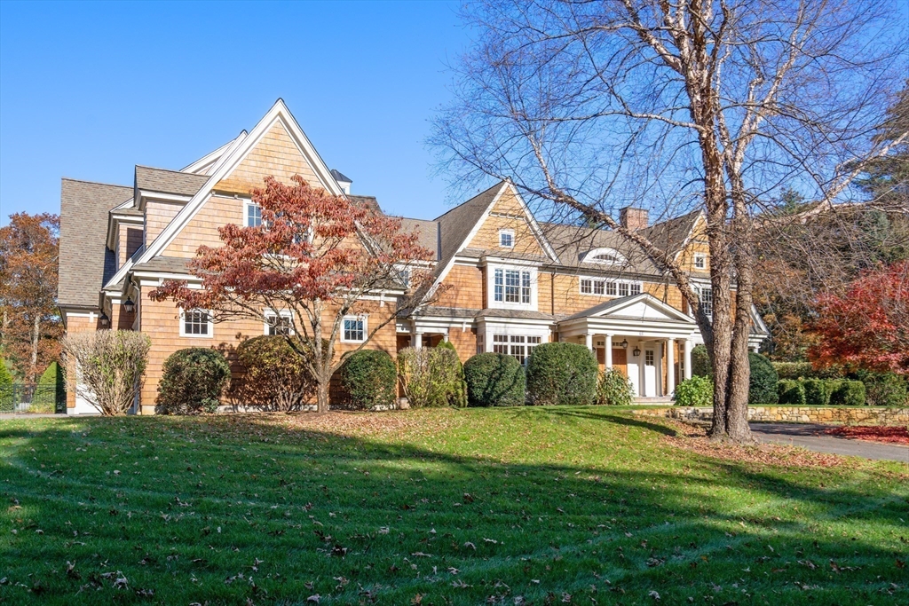 66 Goodnow Road Sudbury, MA 01776 - Photo 3 of 41 a front view of a house with a yard