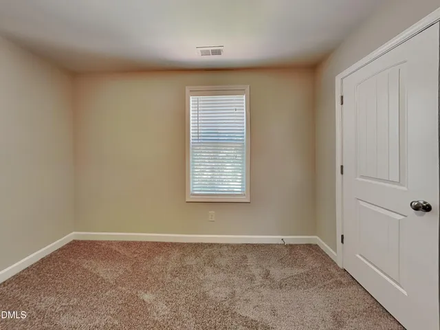 a view of a livingroom with a window