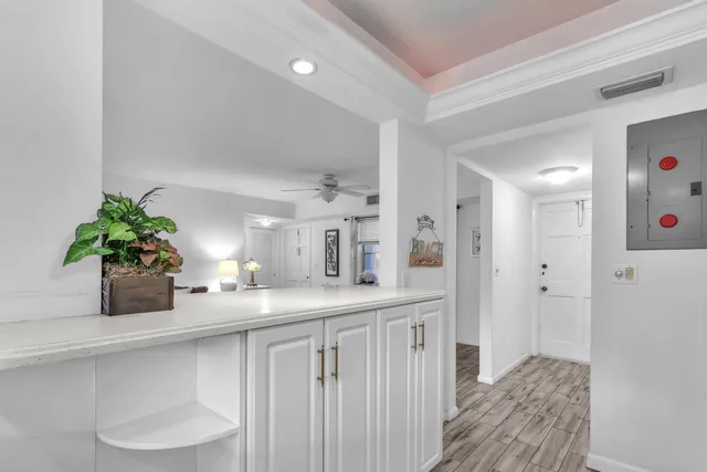 a bathroom with a sink a vanity and a mirror