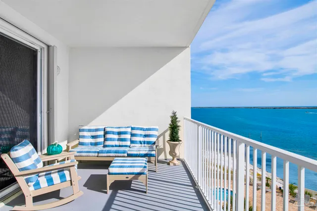 a kitchen with a refrigerator a sink a stove and cabinets