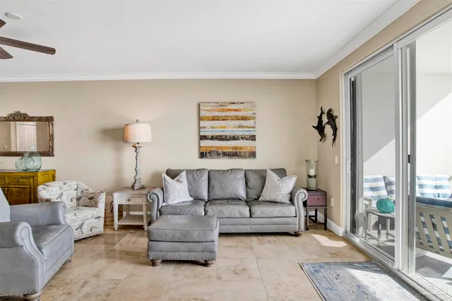 a kitchen with kitchen island granite countertop a sink stainless steel appliances and cabinets