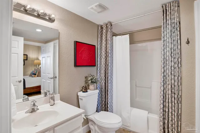 a lobby with a table and chairs