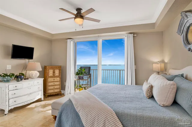 a lobby with furniture and a potted plant