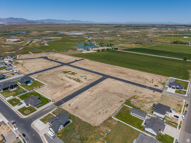 3150 South 5250 West, Unit 210 Hooper, UT 84315 - Photo 2 of 11 Expansive development land featuring new asphalt roads and clearly defined property parcels