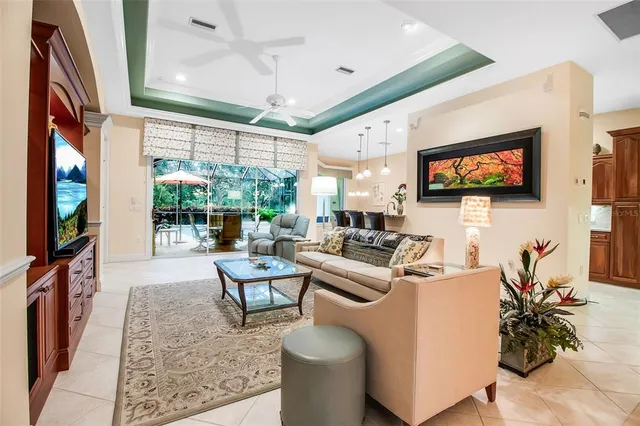a kitchen with a table chairs sink and cabinets