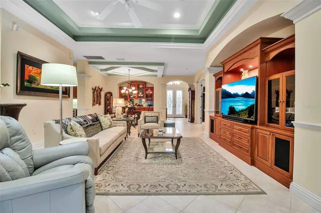 a large kitchen with stainless steel appliances granite countertop a sink stove and cabinets