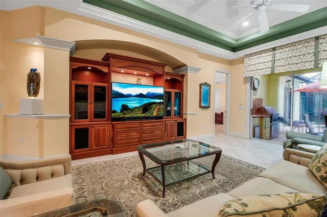 a kitchen with stainless steel appliances granite countertop a sink and a stove