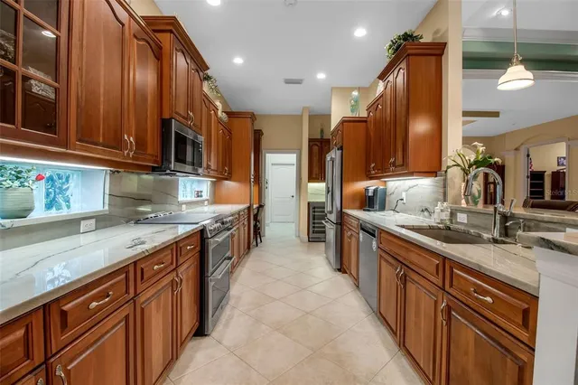 a bathroom with a tub a double vanity sink and a mirror