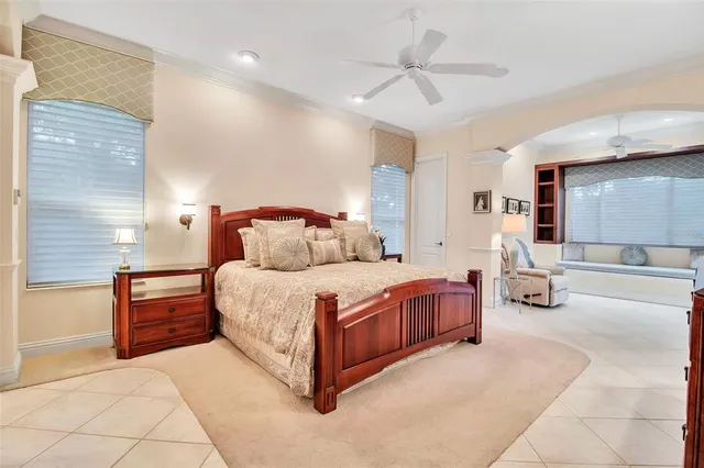 a view of a livingroom with workspace and a window