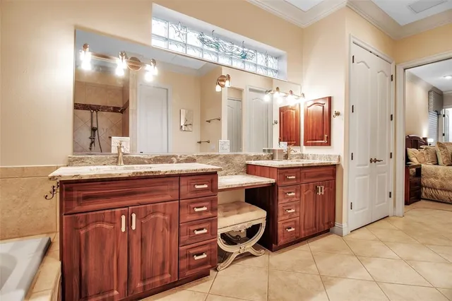 an aerial view of a house with a yard and outdoor seating