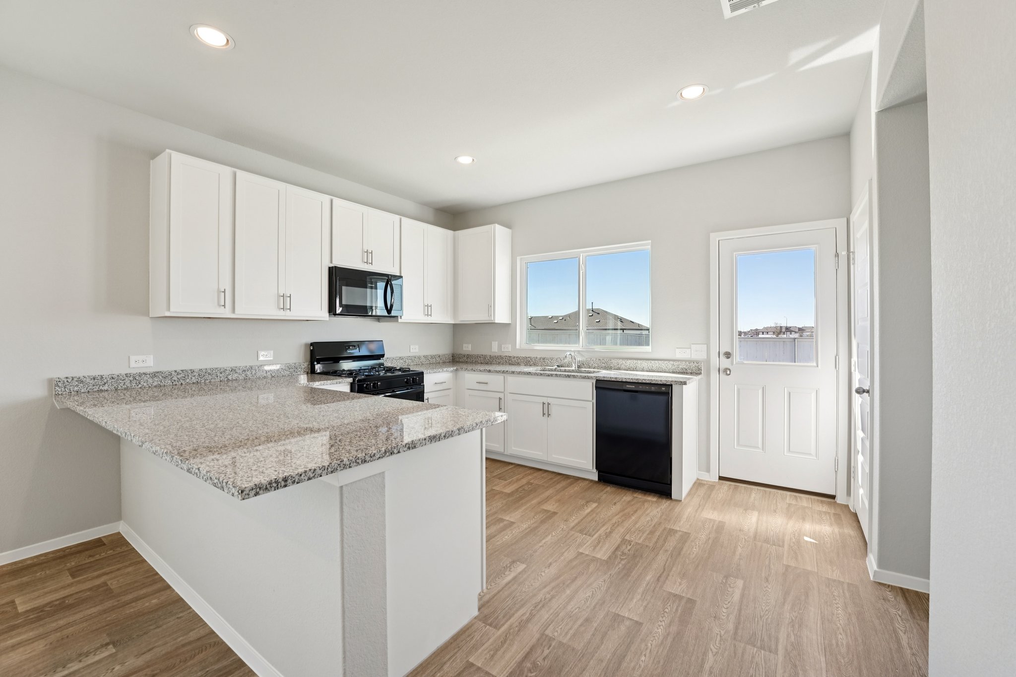 136 Summer Drive Elgin, TX 78621 - Photo 8 of 35 Light & Bright Open Concept Kitchen