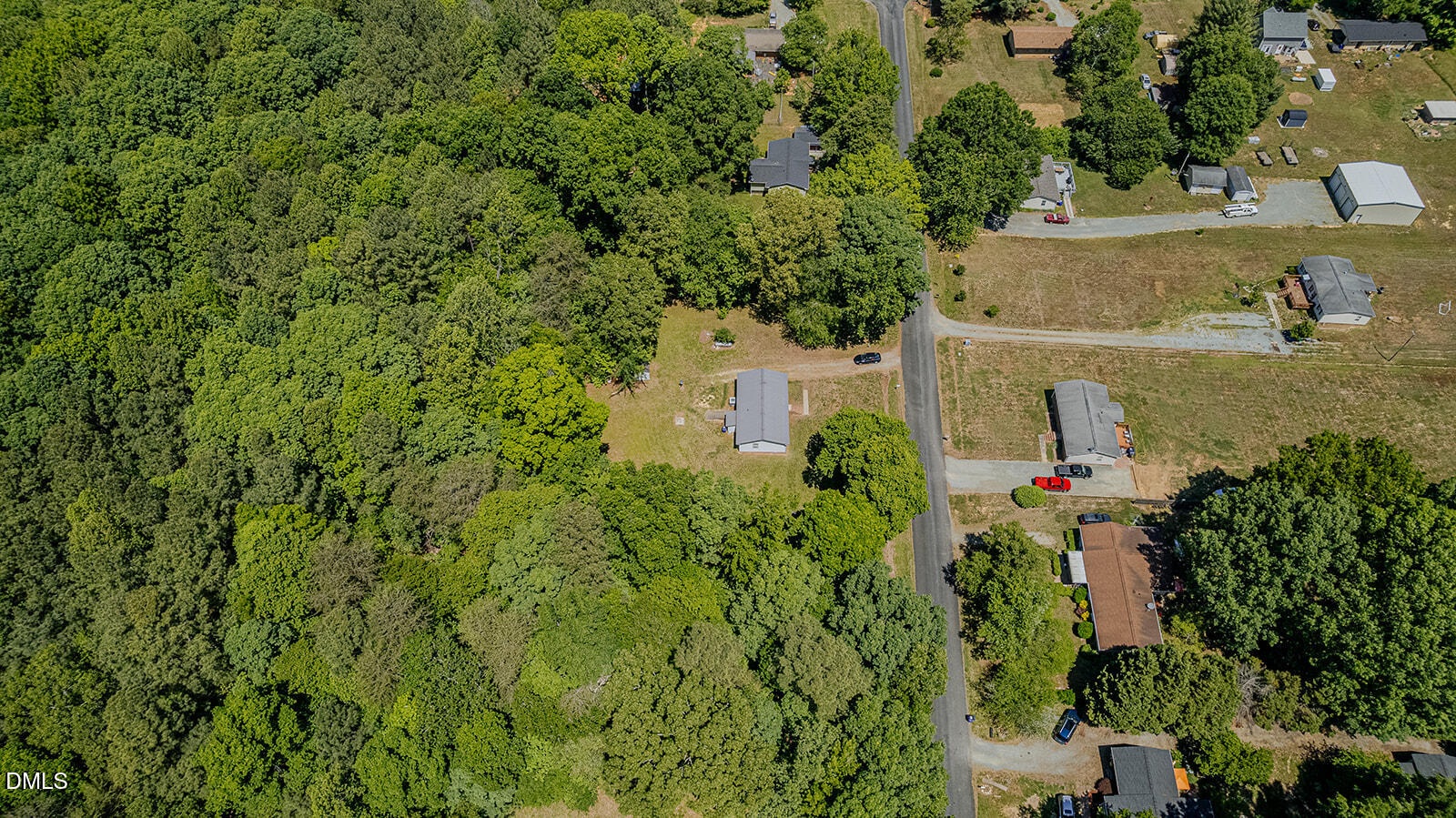 1302 Blacksmith Road Efland, NC 27243 - Photo 41 of 46 an aerial view of a house with a yard