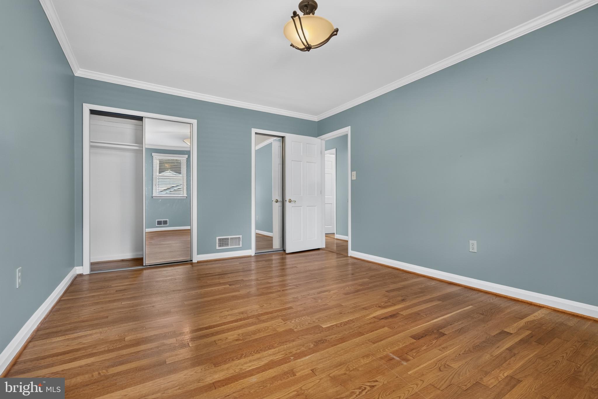 3 North Hilltop Road Baltimore, MD 21228 - Photo 18 of 34 Primary bedroom w 2 convenient mirrored closets