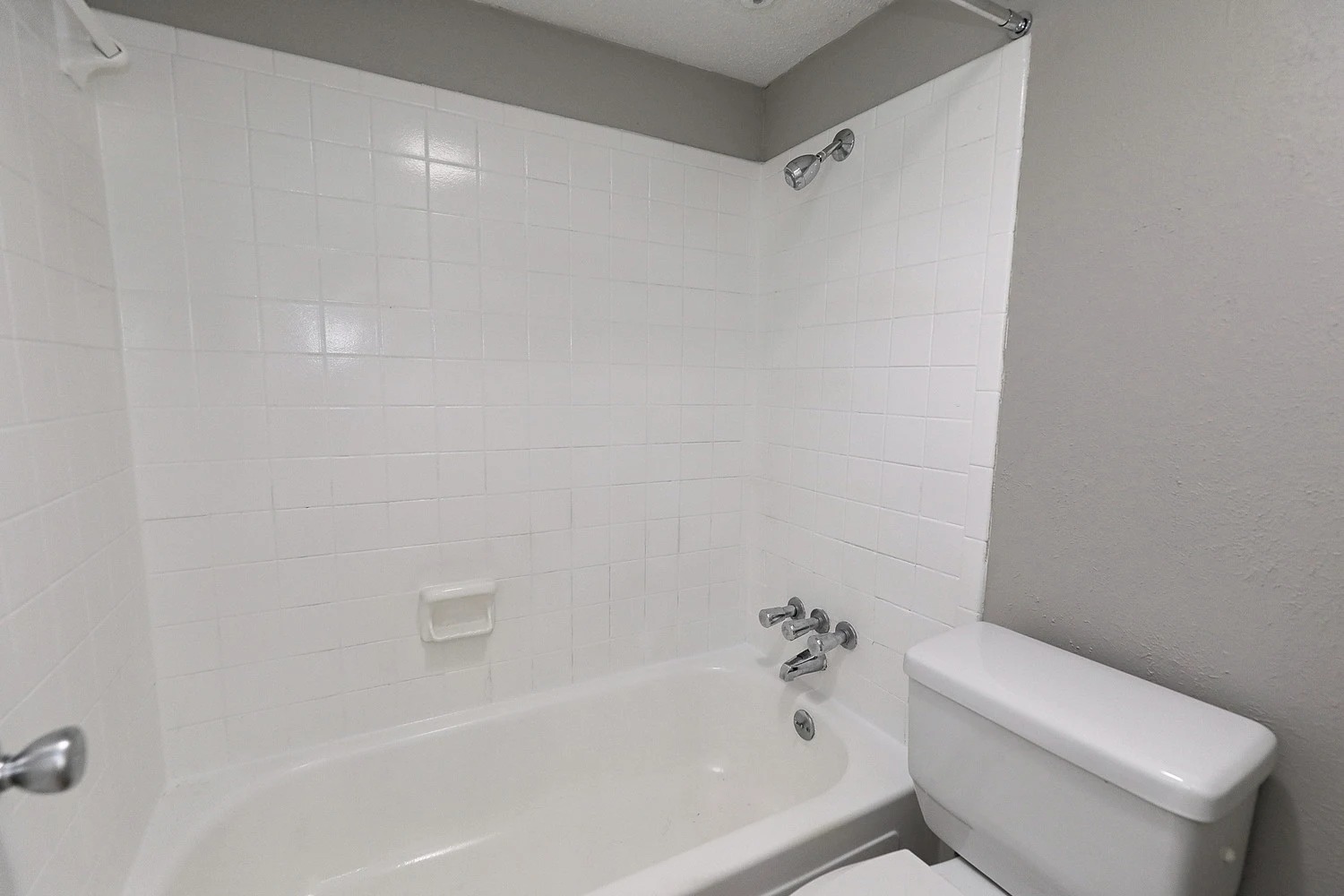 8100 North Mopac Expressway, Unit 17175 Austin, TX 78759 - Photo 17 of 22 Full bathroom with shower / washtub combination and a textured wall