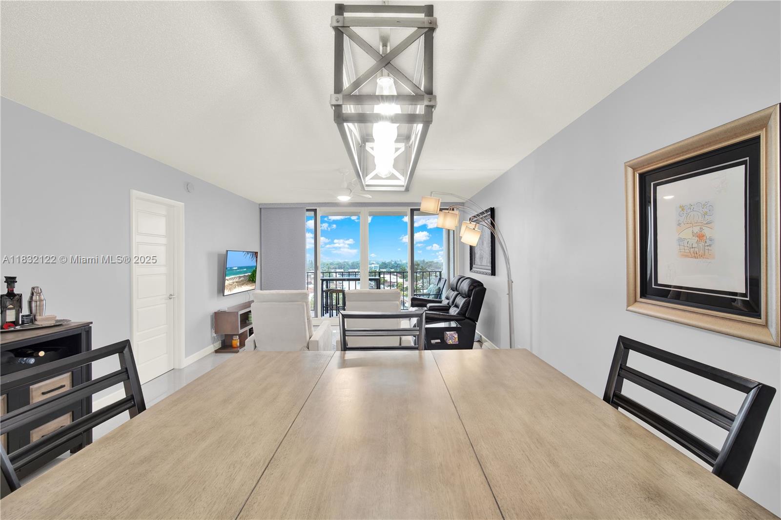 521 North Riverside Drive, Unit 707 Pompano Beach, FL 33062 - Photo 11 of 50 a view of a livingroom with furniture and a window