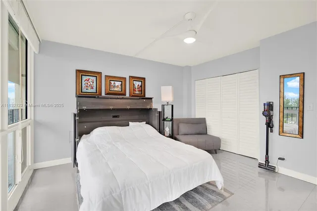 a bed room with a bed and a night stand