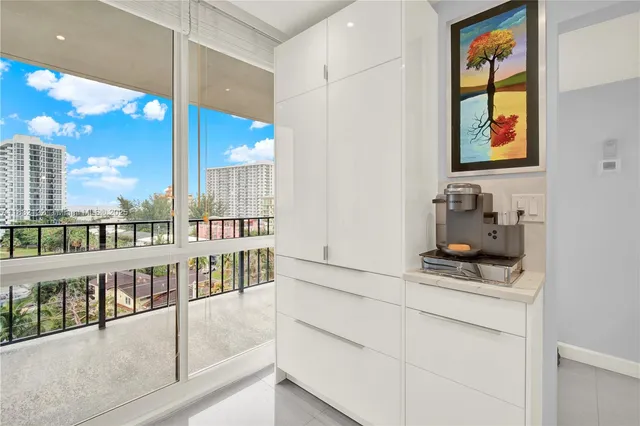 a bathroom with a sink and a window