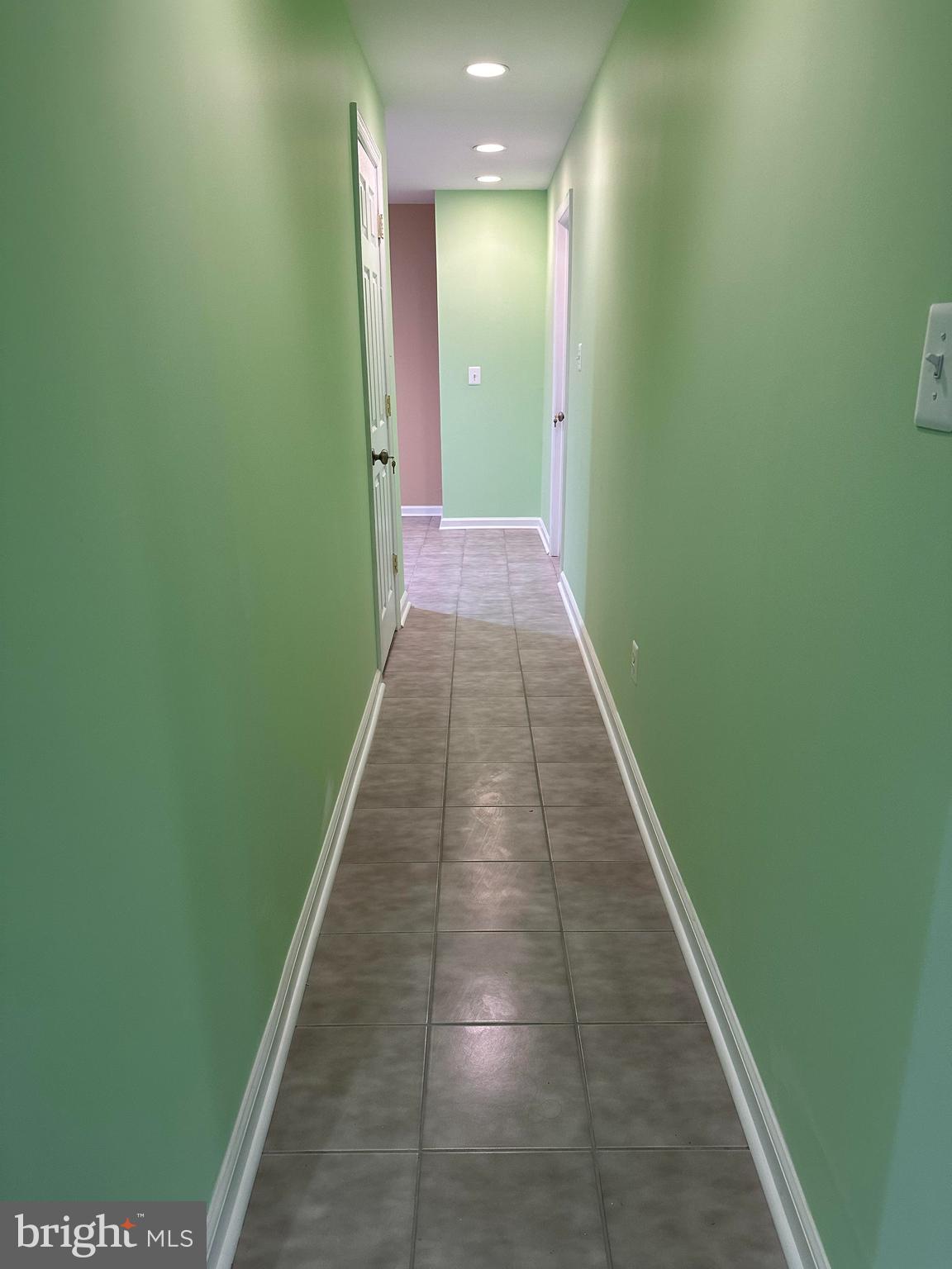 8392 Tenbrook Drive Gainesville, VA 20155 - Photo 6 of 10 Hallway to Laundry/Kitchen