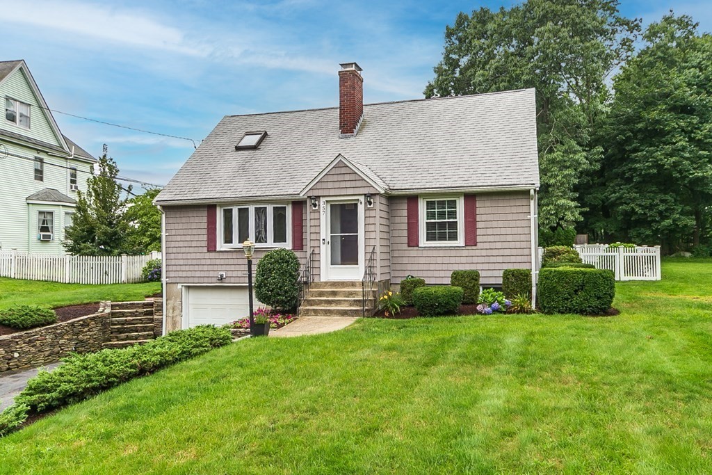 357 Webster Street Needham, MA 02494 - Photo 1 of 30 a front view of a house with a yard and green space