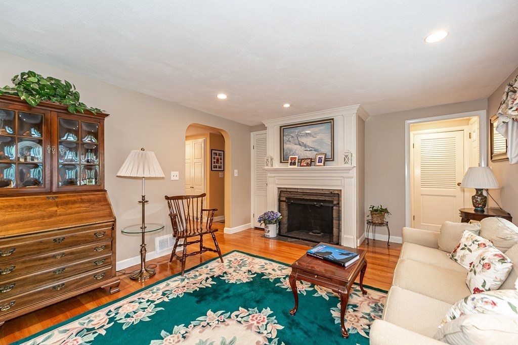 357 Webster Street Needham, MA 02494 - Photo 18 of 30 a living room with furniture fireplace and wooden floor