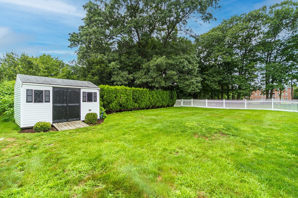 357 Webster Street Needham, MA 02494 - Photo 28 of 30 a view of a house with a yard and sitting area