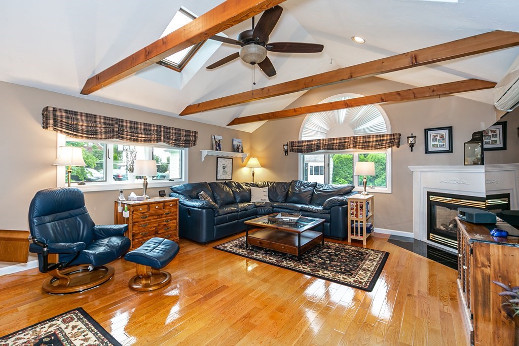 357 Webster Street Needham, MA 02494 - Photo 8 of 30 a living room with furniture fireplace and a large window