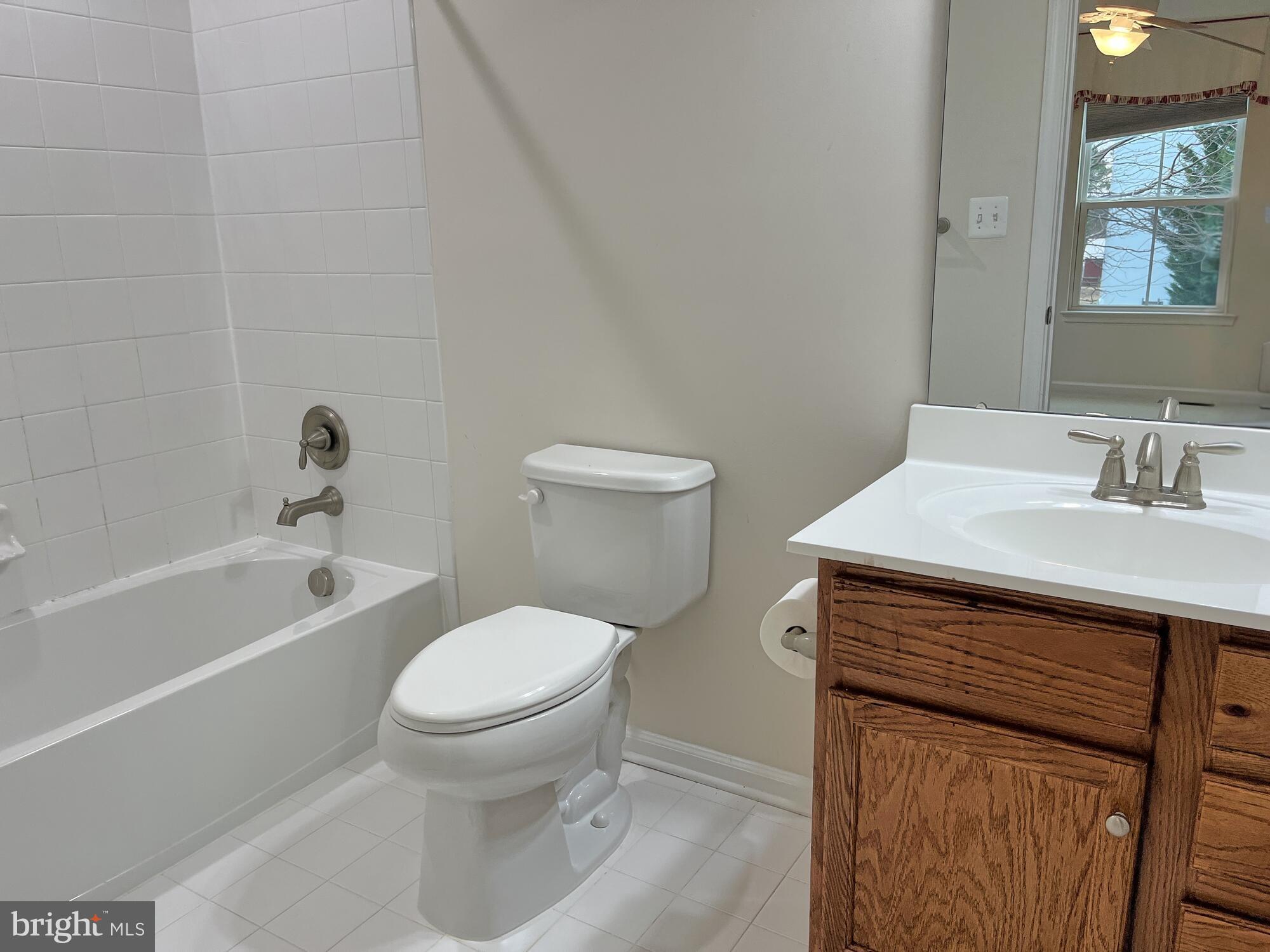 120 Standpipe Road Culpeper, VA 22701 - Photo 12 of 22 a bathroom with a sink toilet and shower