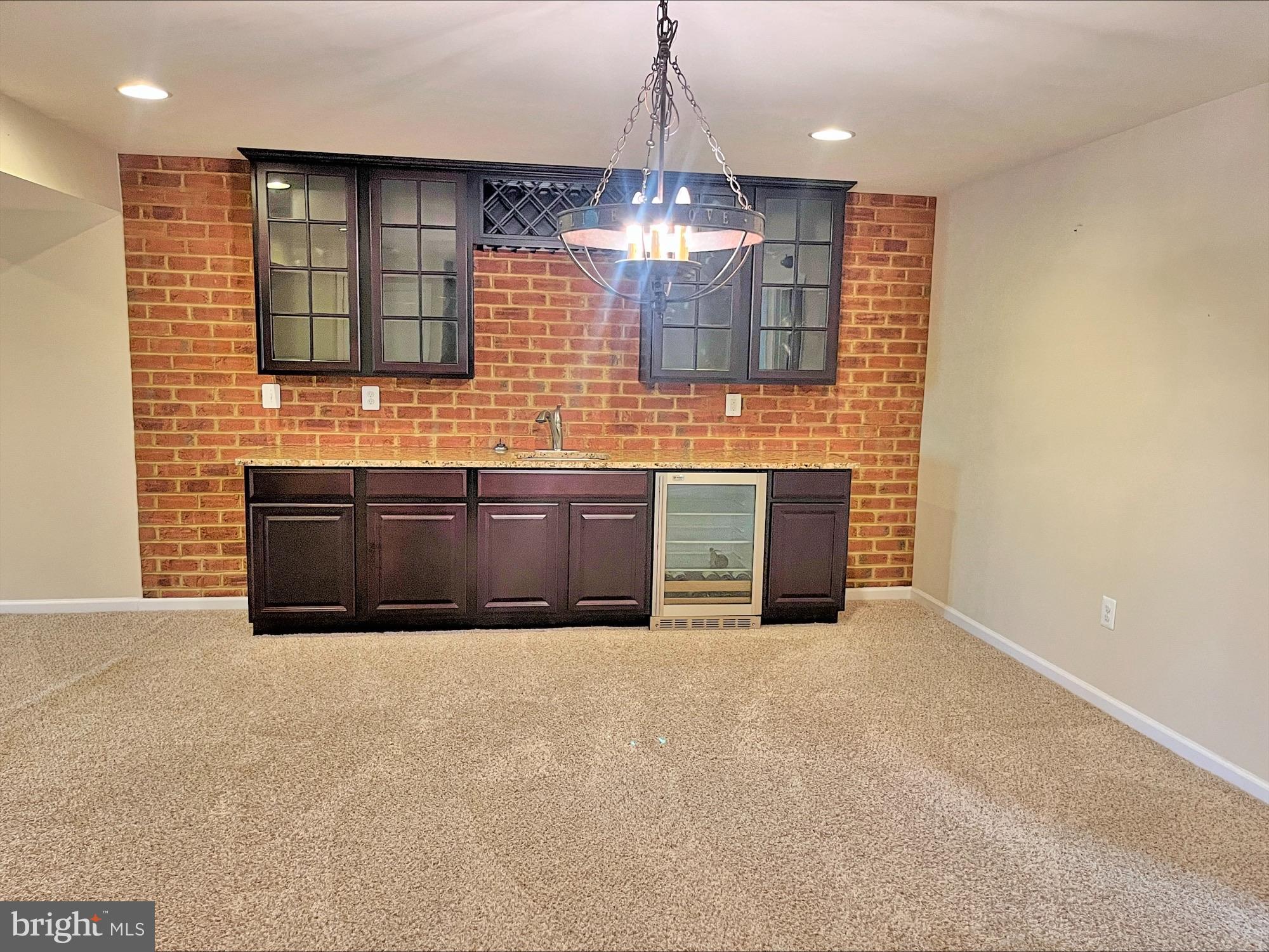 120 Standpipe Road Culpeper, VA 22701 - Photo 18 of 22 a view of an empty room with a kitchen