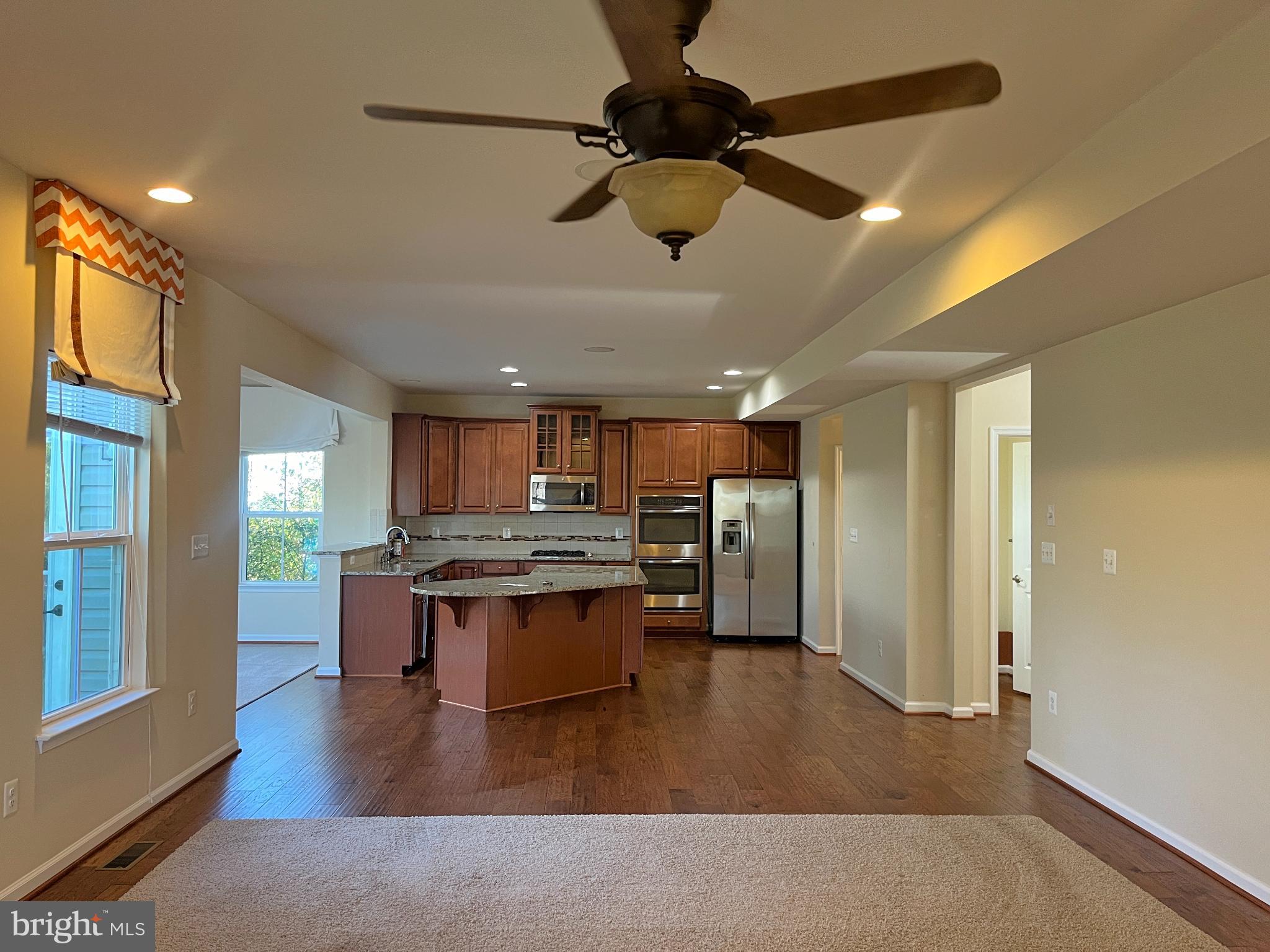 120 Standpipe Road Culpeper, VA 22701 - Photo 3 of 22 a living room with stainless steel appliances granite countertop furniture and a kitchen view