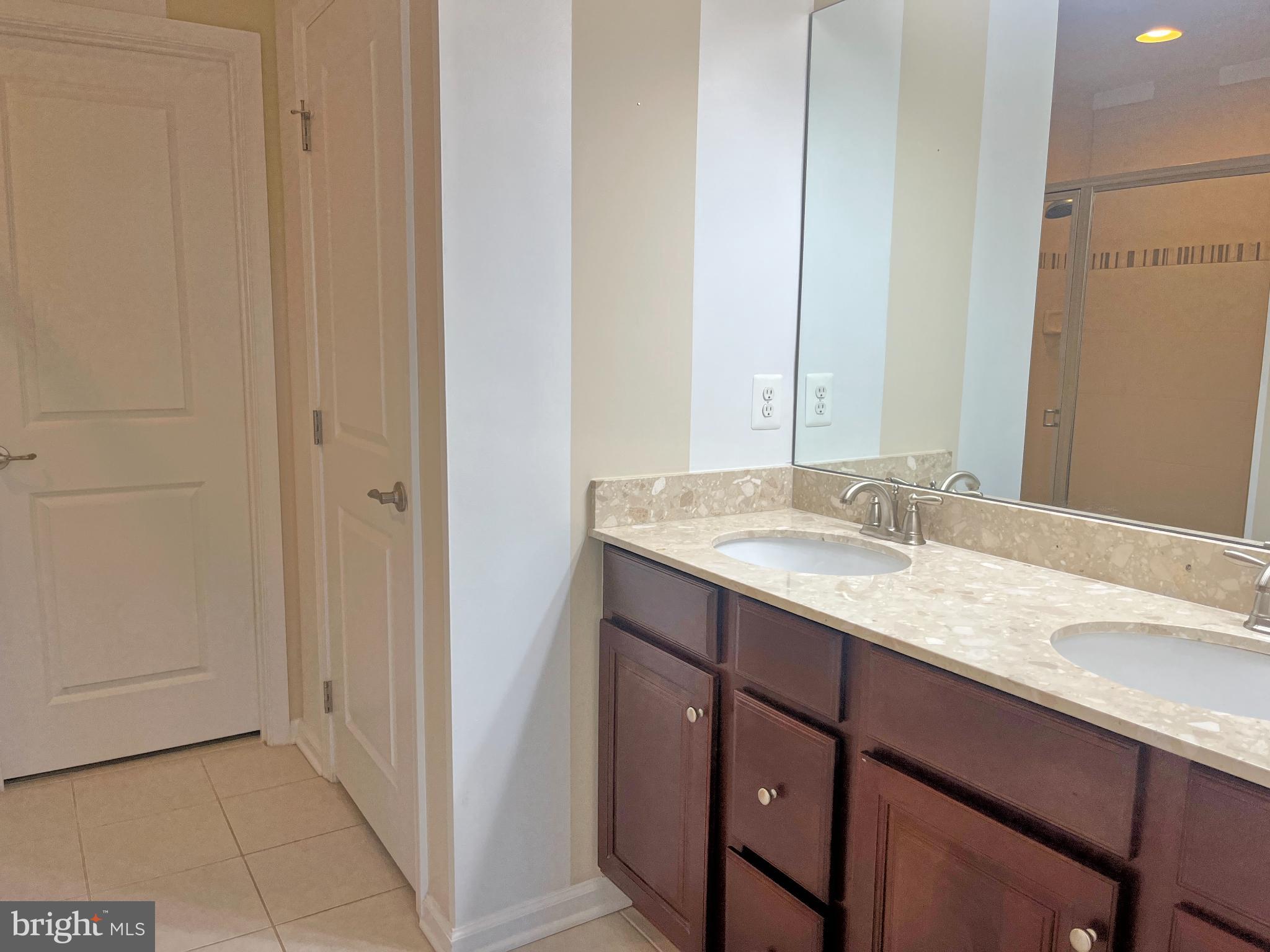 120 Standpipe Road Culpeper, VA 22701 - Photo 10 of 22 a bathroom with a granite countertop sink and a mirror
