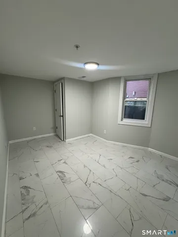 en empty room with windows