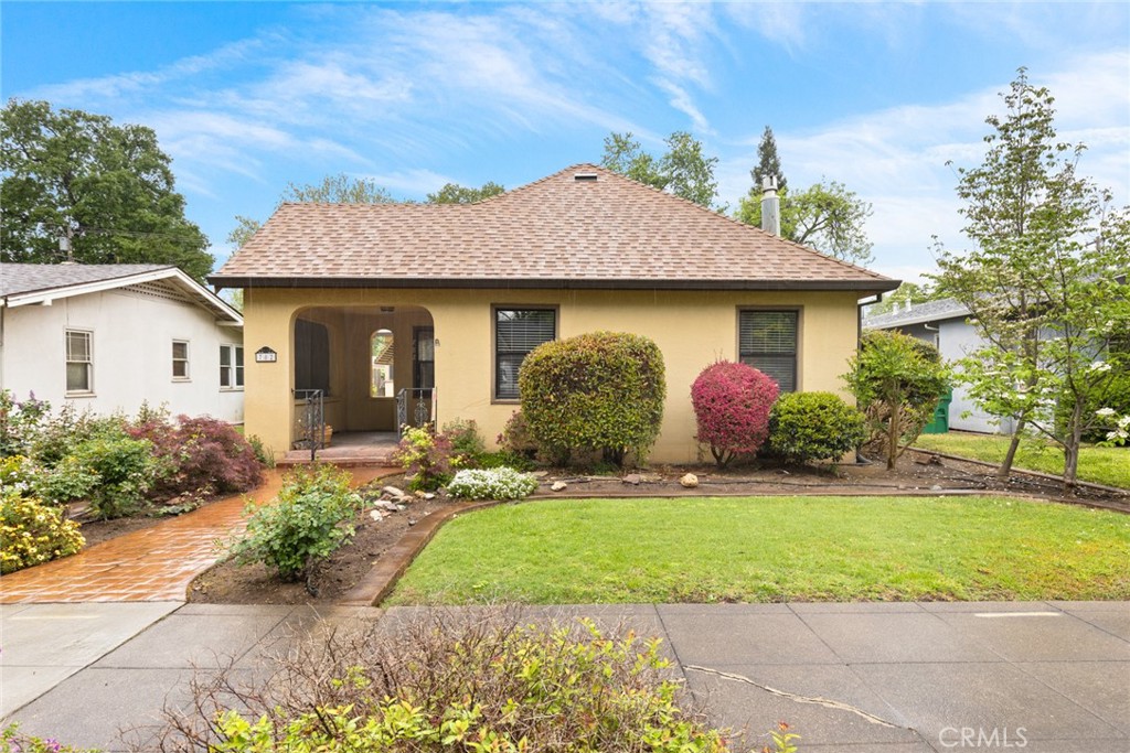782 East 8th Street Chico, CA 95928 - Photo 1 of 1 a front view of house with yard and green space