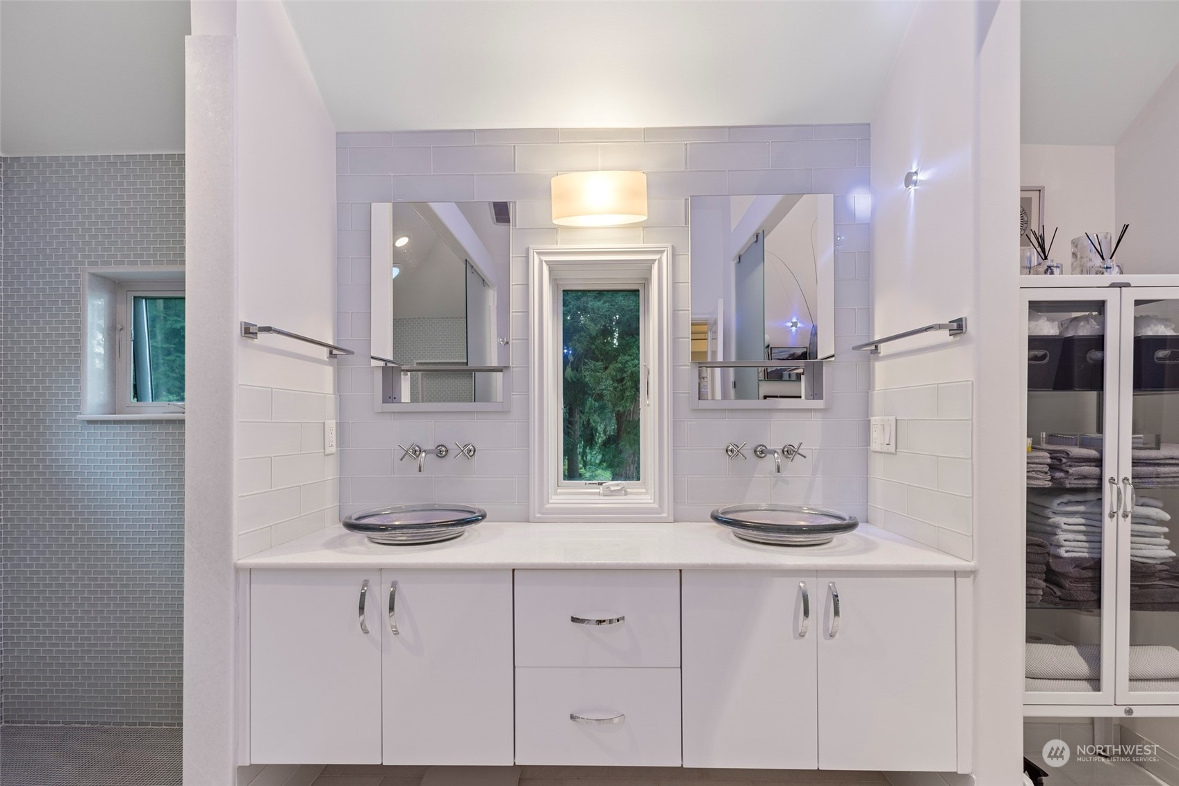 4903 Saratoga Road Langley, WA 98260 - Photo 19 of 40 a bathroom with a double vanity sink mirror and double