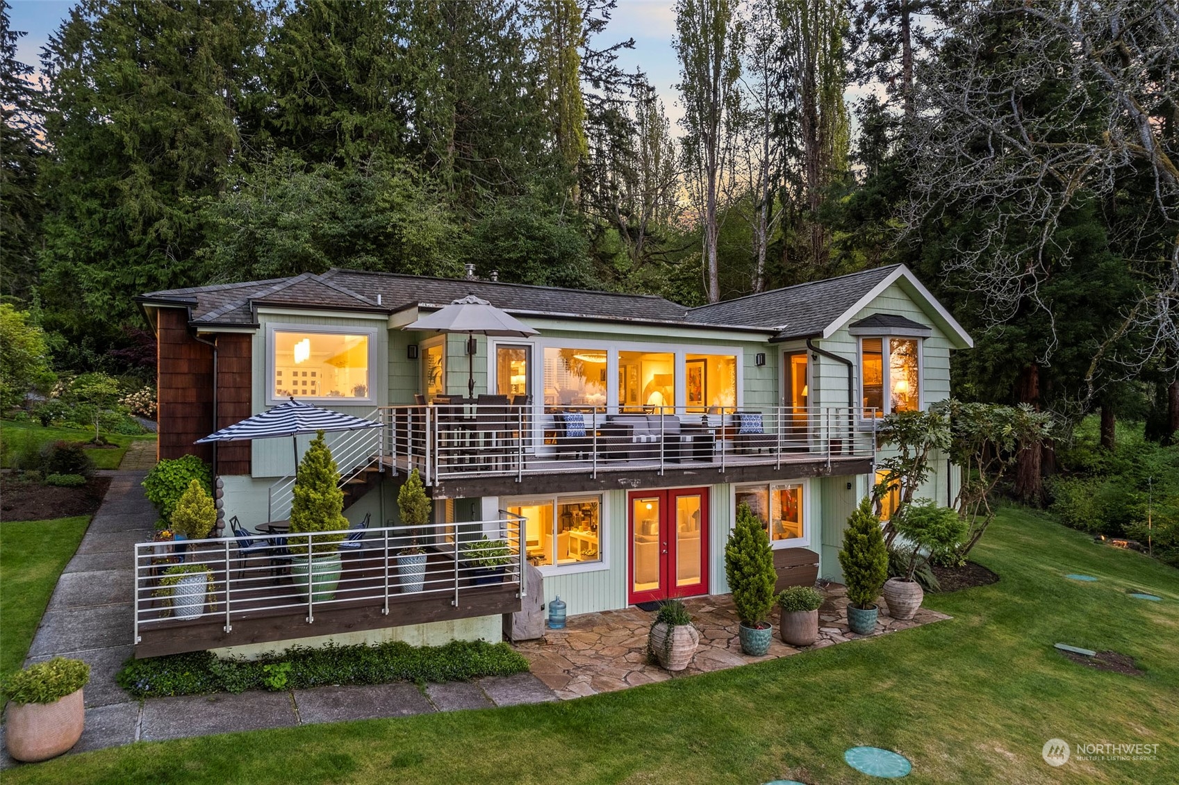 4903 Saratoga Road Langley, WA 98260 - Photo 2 of 40 a view of house with a yard and balcony