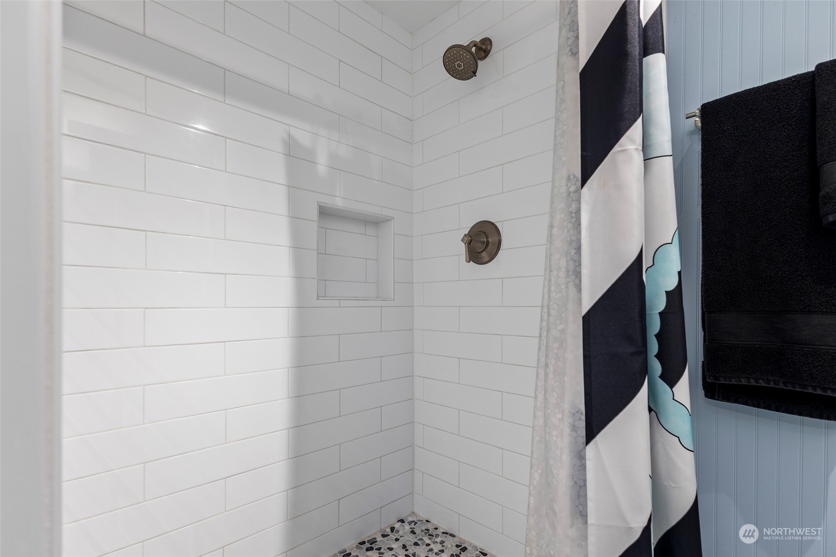 4903 Saratoga Road Langley, WA 98260 - Photo 24 of 40 a bathroom with a shower