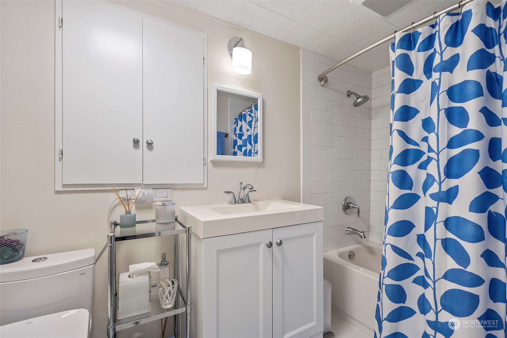 4903 Saratoga Road Langley, WA 98260 - Photo 27 of 40 a bathroom with a sink toilet and shower