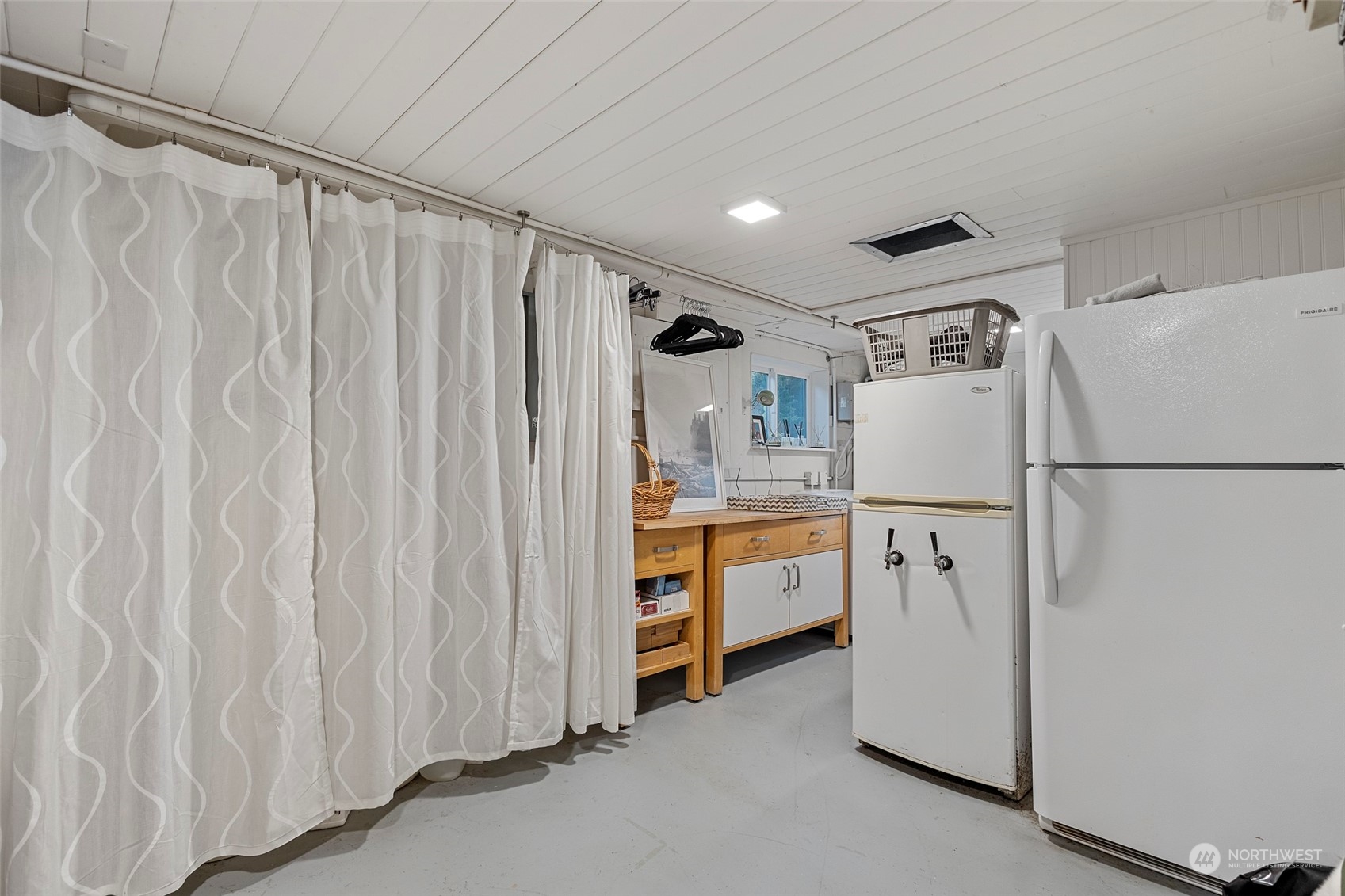 4903 Saratoga Road Langley, WA 98260 - Photo 28 of 40 a kitchen with stainless steel appliances a refrigerator and a refrigerator