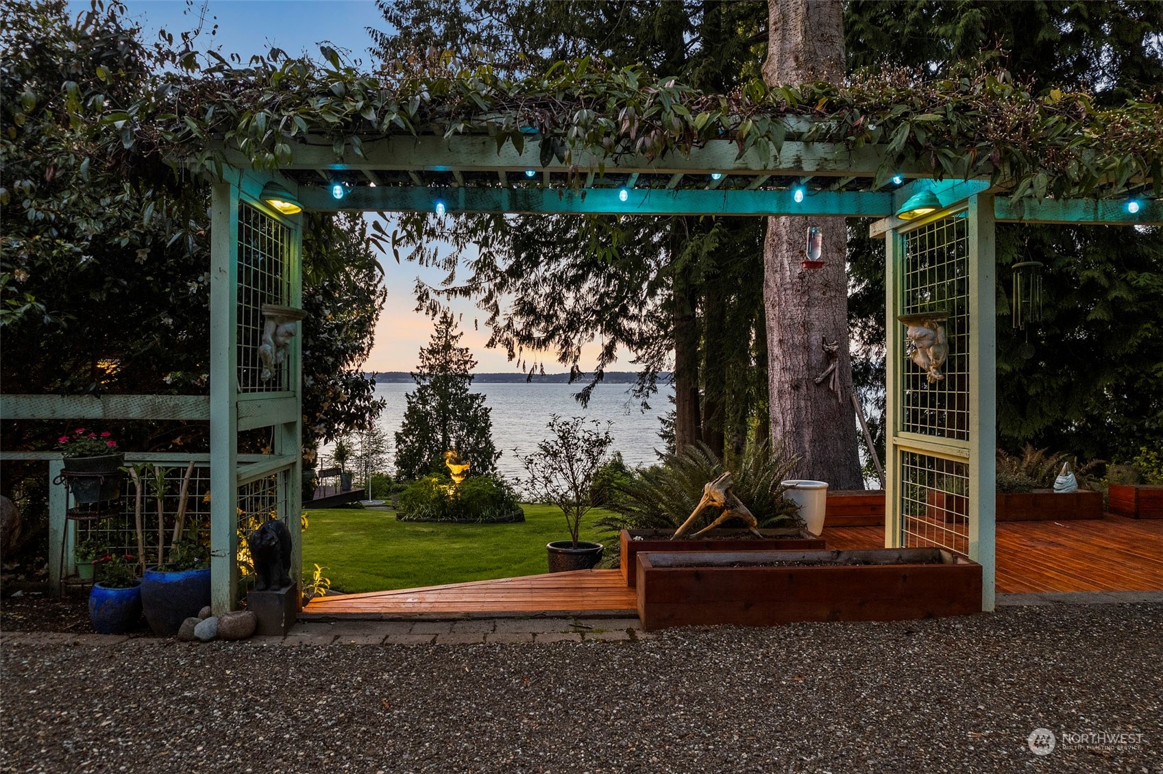 4903 Saratoga Road Langley, WA 98260 - Photo 32 of 40 a view of a bench in a yard