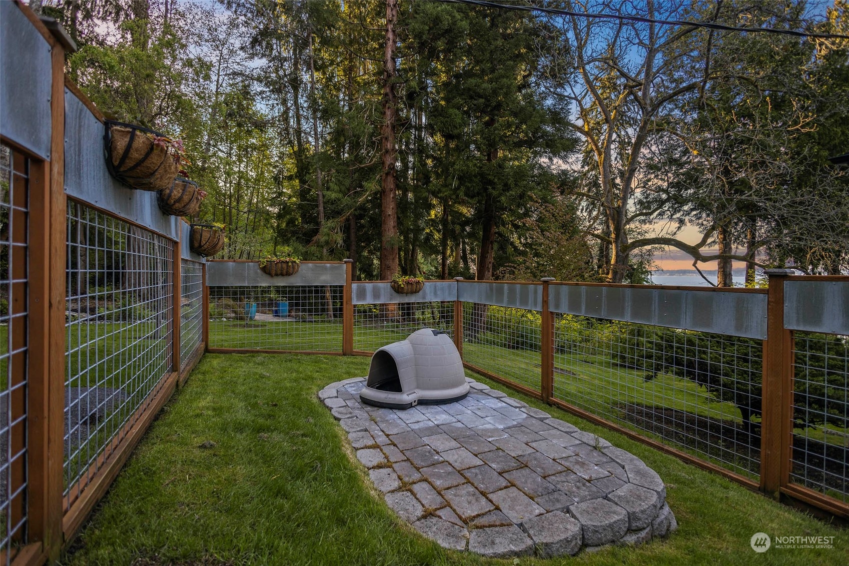 4903 Saratoga Road Langley, WA 98260 - Photo 35 of 40 a view of a backyard with wooden fence