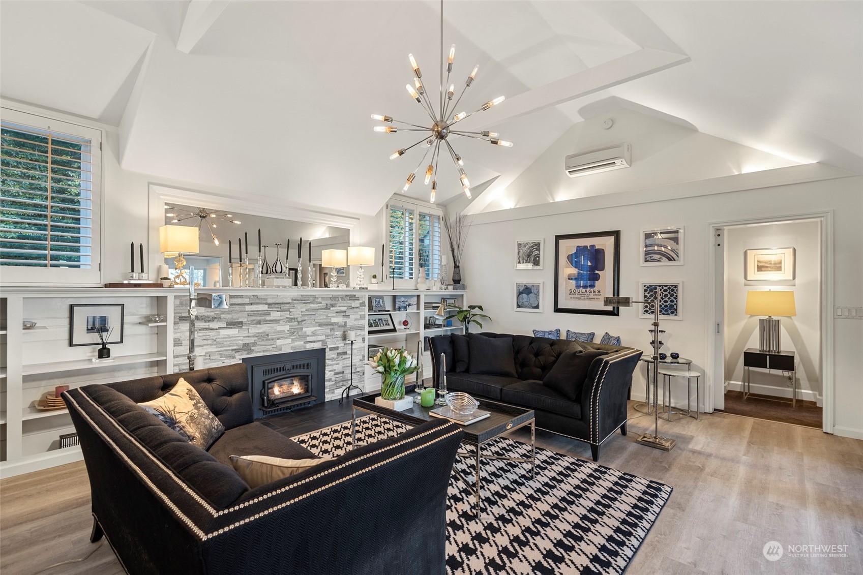 4903 Saratoga Road Langley, WA 98260 - Photo 5 of 40 a living room with furniture and a fireplace