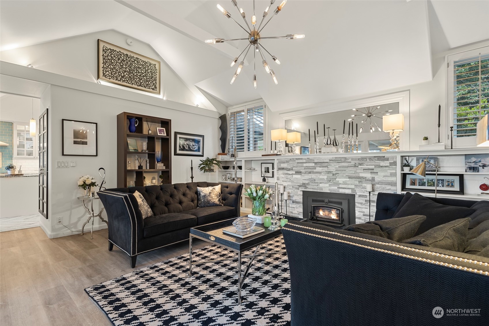 4903 Saratoga Road Langley, WA 98260 - Photo 7 of 40 a living room with furniture and a fireplace